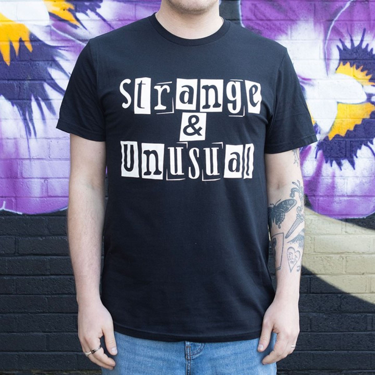 Strange & Unusual Unisex T-shirt Size M