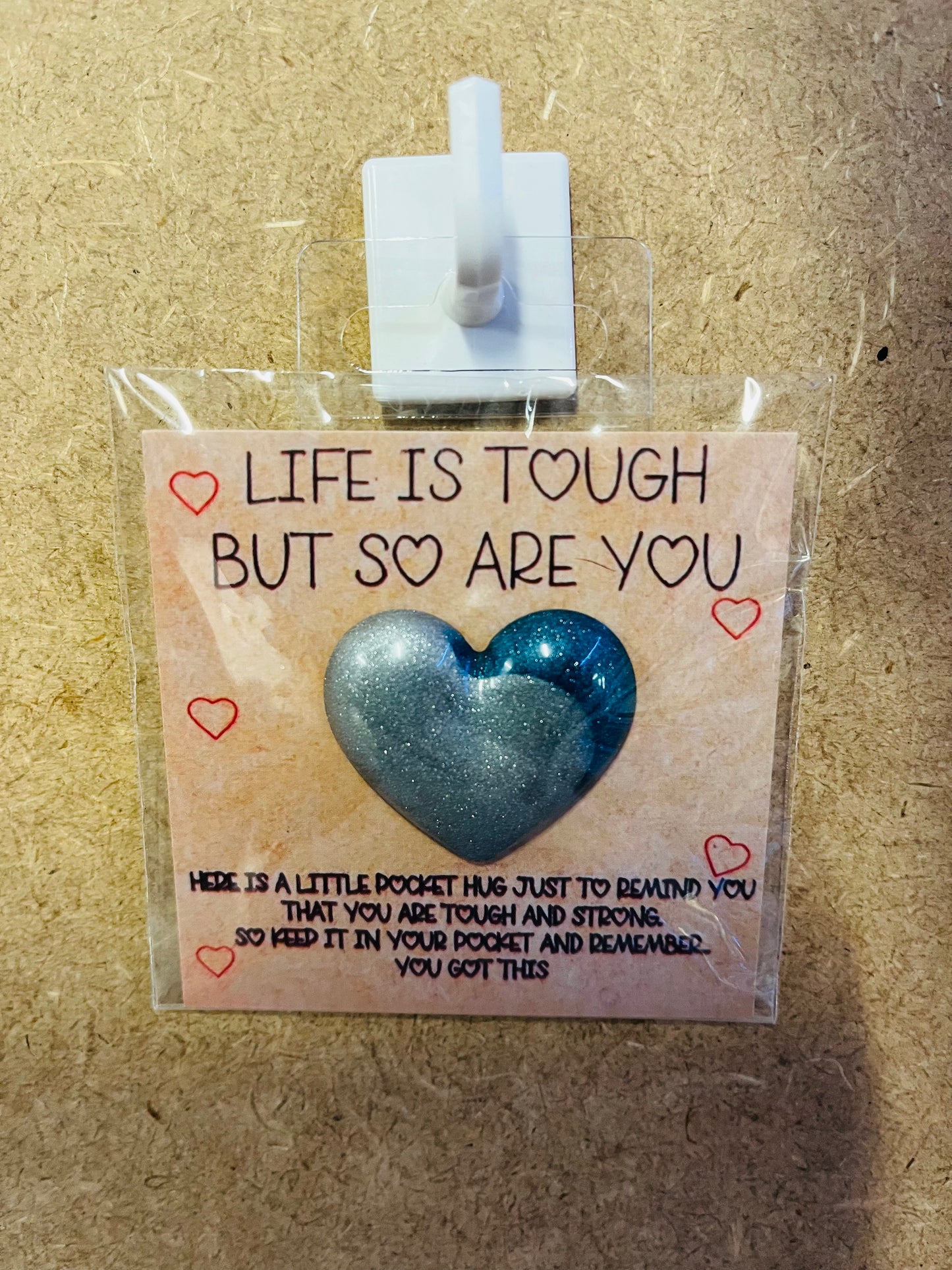 Life is tough pocket hug