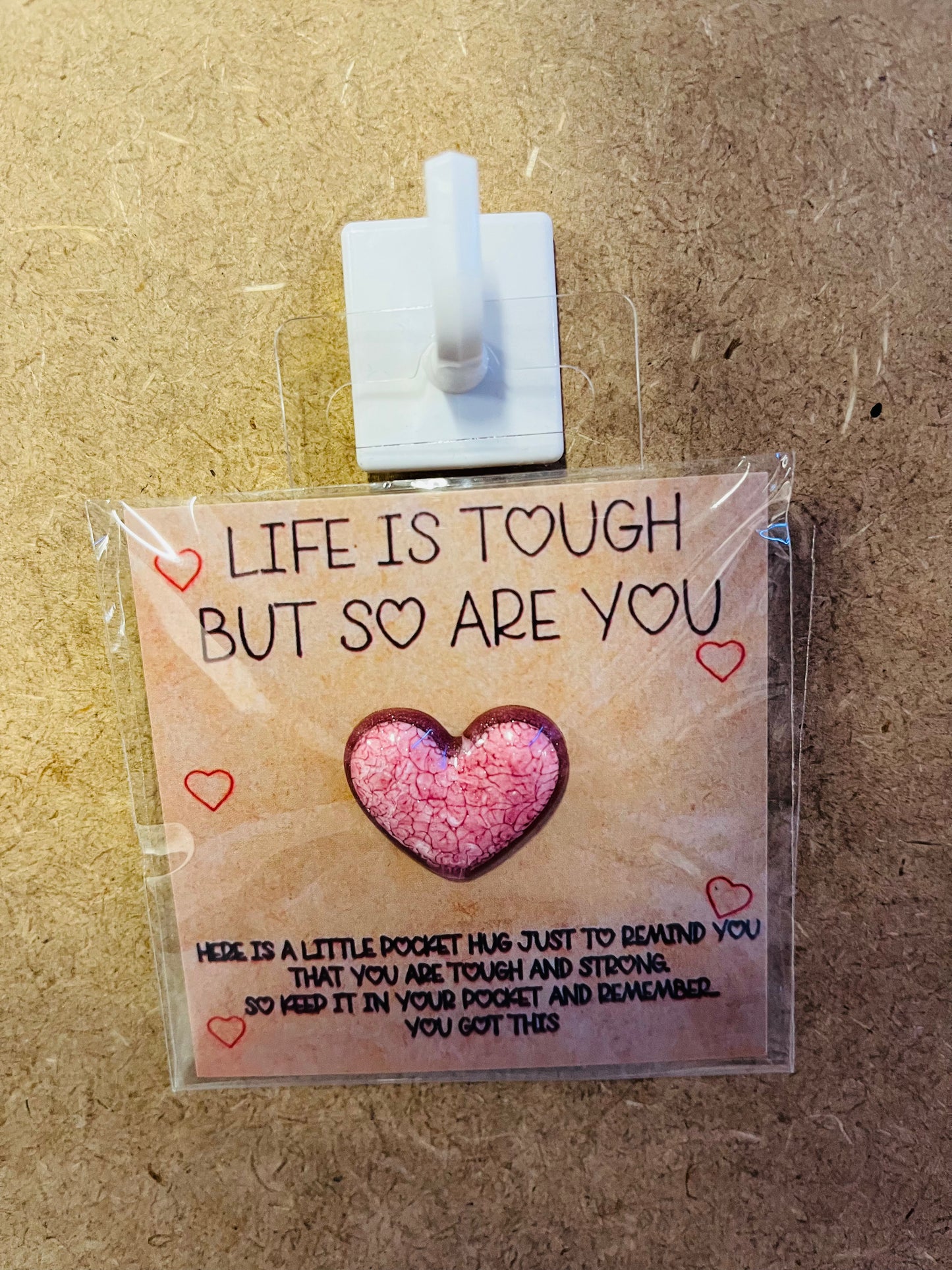 Life is tough pocket hug