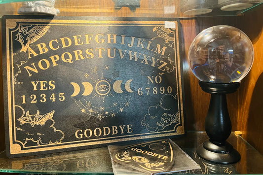 Talking board with planchette
