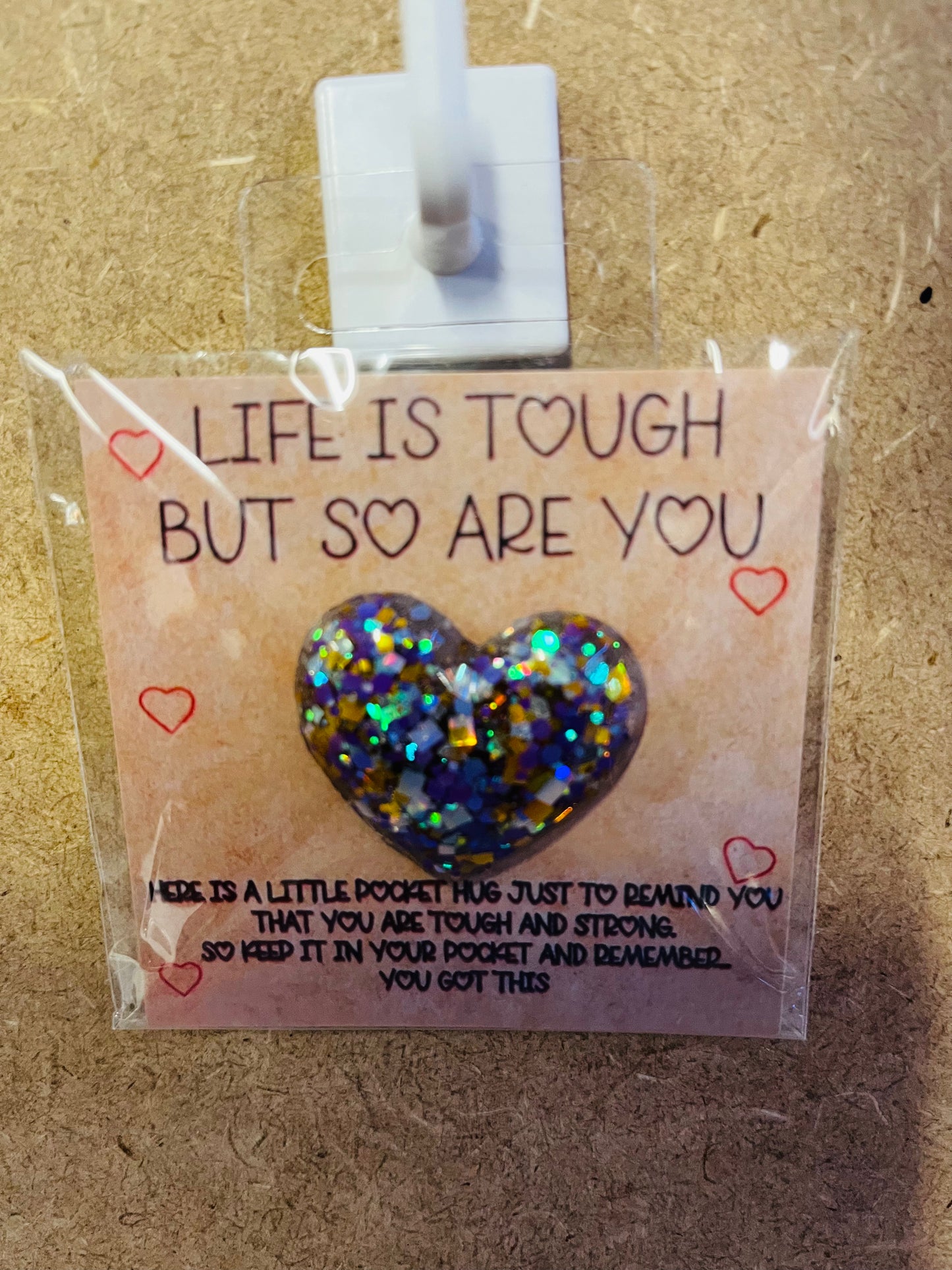 Life is tough pocket hug