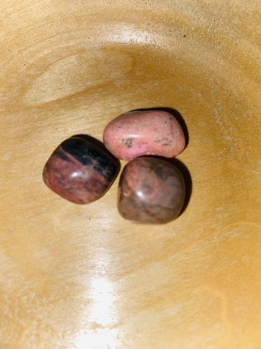 Rhodonite tumbles